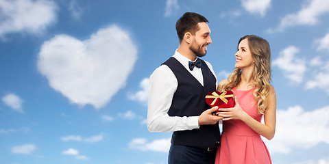 Image showing happy couple with gift on valentines day