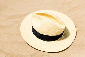 Image showing straw hat on beach sand