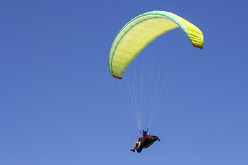 Image showing Paragliding in the blue sky as background extreme sport