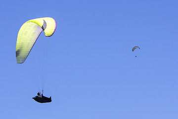 Image showing Paragliding in the blue sky as background extreme sport