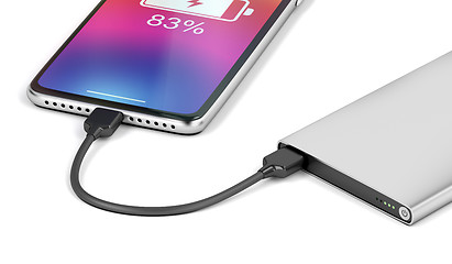 Image showing Smartphone charging with power bank