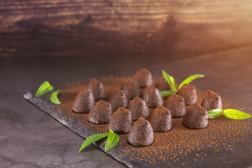 Image showing Chocolate truffles powdered with cocoa