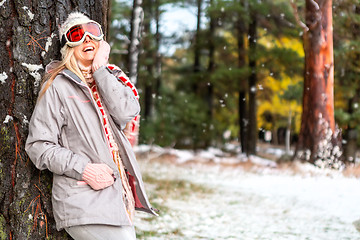 Image showing Joyful female in a snowy winter woodland forest