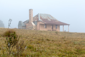 Image showing Old homestead in thick morning fog