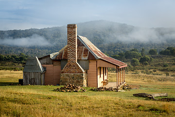 Image showing Old country homestead as the morning fog lifts