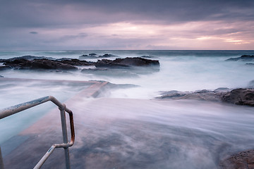 Image showing Large waves engulf the public rock pool in Bermagui