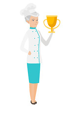 Image showing Seinor caucasian chef holding a trophy.