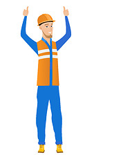 Image showing Caucasian builder standing with raised arms up.