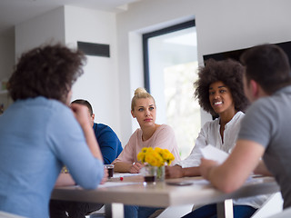 Image showing Multiethnic startup Business Team At A Meeting at modern office 