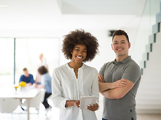 Image showing Multiethnic startup Business Team At A Meeting at modern office 