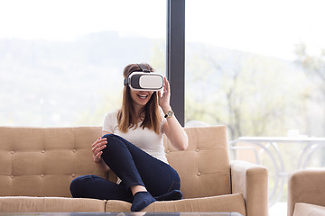 Image showing woman using VR-headset glasses of virtual reality