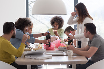 Image showing multiethnic group of happy friends lunch time