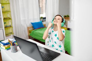 Image showing boy celebrating victory in computer video game