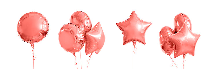 Image showing pink metallic gold helium balloons on white