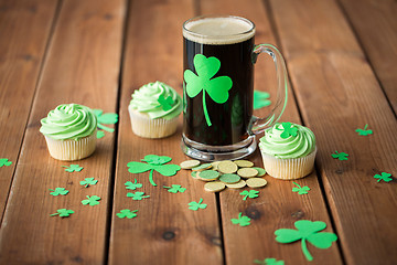 Image showing shamrock on glass of beer, green cupcake and coins