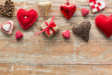 Image showing christmas gift and heart shaped decorations