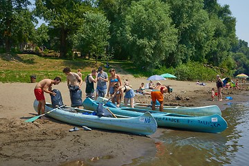 Image showing Canoes on the Riverside