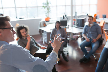 Image showing Young Business Team At A Meeting at modern office building