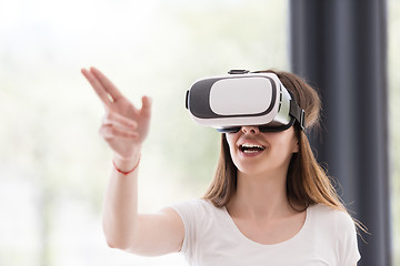 Image showing woman using VR-headset glasses of virtual reality