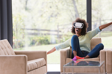 Image showing black woman using VR headset glasses of virtual reality