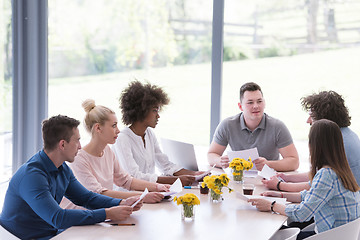 Image showing Multiethnic startup business team on meeting