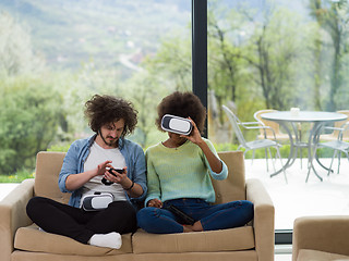 Image showing Multiethnic Couple using virtual reality headset