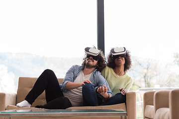 Image showing Multiethnic Couple using virtual reality headset