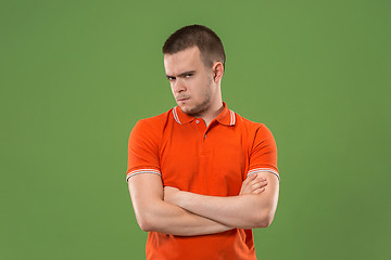 Image showing Suspiciont. Doubtful pensive man with thoughtful expression making choice