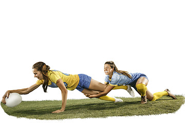 Image showing The young female rugby players isolated on white backround