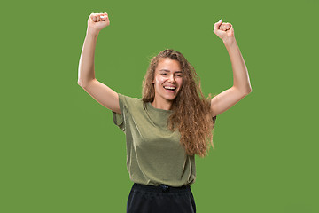 Image showing Winning success woman happy ecstatic celebrating being a winner. Dynamic energetic image of female model