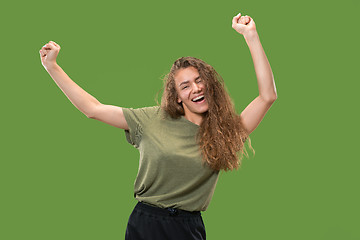 Image showing Winning success woman happy ecstatic celebrating being a winner. Dynamic energetic image of female model