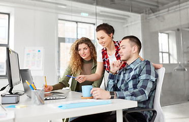 Image showing creative team with laptop working at office