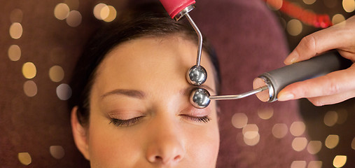 Image showing woman having hydradermie facial treatment in spa