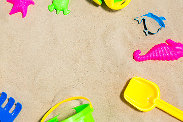 Image showing close up of sand toys kit on summer beach