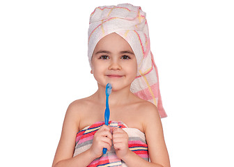 Image showing Little girl brushing teeth