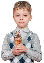 Image showing Little boy eating chocolate ice cream