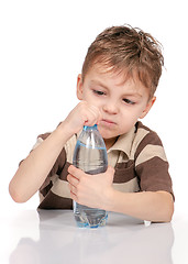 Image showing Little boy with bottle of water