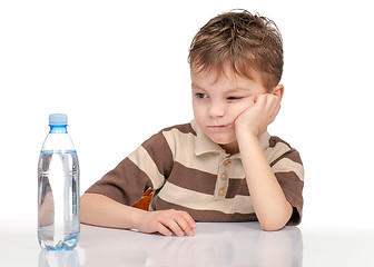 Image showing Little boy with bottle of water
