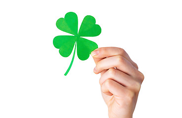 Image showing hand holding green paper four-leaf clover