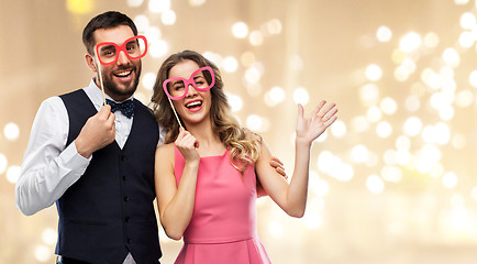 Image showing couple with party props having fun and posing