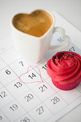 Image showing close up of calendar, coffee, cupcake and heart