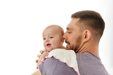 Image showing father with little baby girl at home