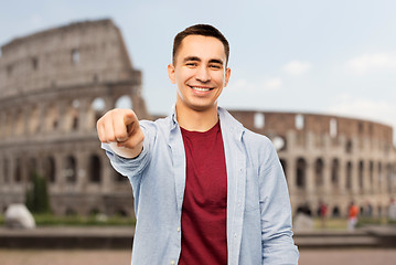 Image showing man pointing to you over coliseum background