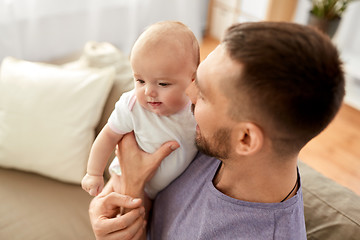 Image showing close up of father with little baby girl at home