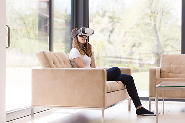 Image showing woman using VR-headset glasses of virtual reality