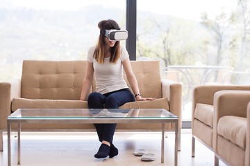 Image showing woman using VR-headset glasses of virtual reality