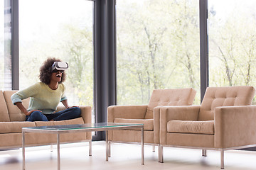 Image showing black woman using VR headset glasses of virtual reality