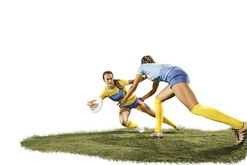 Image showing The young female rugby players isolated on white backround