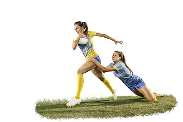 Image showing The young female rugby players isolated on white backround