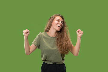 Image showing Winning success woman happy ecstatic celebrating being a winner. Dynamic energetic image of female model